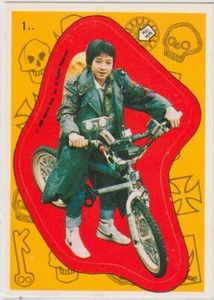 1985 Topps The Goonies Warner Bros Sticker Card #1 - Data on Bike - Ke Huy Quan
