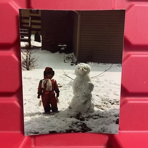 Young Boy Standing By Snowman 3 3/8 x 4 3/8 Photograph Pre Owned Vintage 1984 - Picture 1 of 2