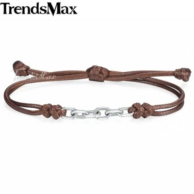 Pulsera ajustable de cuero de acero inoxidable con bordillo de cable para mujer y hombre Foto 1 de 4
