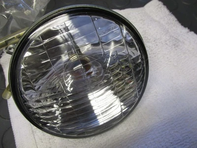 Unidad de faros NOS Suzuki 1969 AS50 35121-27610 Foto 1 de 4