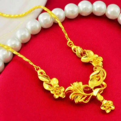 NUEVO Colgante Flor Dorada de la Suerte Mujer Oro Amarillo 24K Relleno Collar Cadena Ondulada Foto 1 de 4