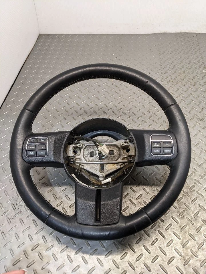 Factory Black Steering Wheel w/ Buttons OEM for 11-18 Jeep Wrangler  1149604 - Image 1 of 4