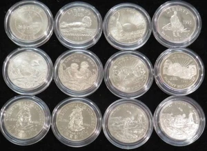 (12) DIFFERENT 50c COMMEMORATIVE BU / PROOF COINS IN CAPSULES - Picture 1 of 2