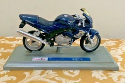 Maisto Triumph Sprint RS New with stand! Free WORLDWIDE SHIPPING! - Image 1 of 4