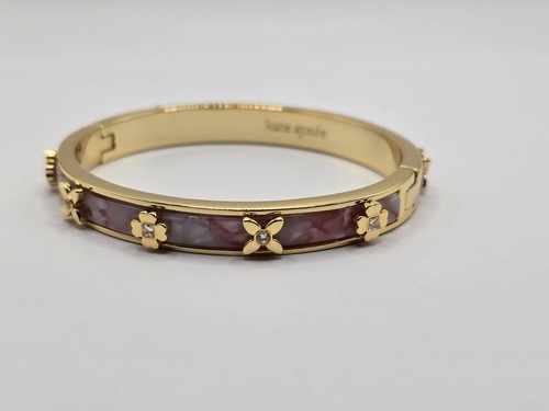 KATE SPADE Bracciale monogramma Kate Pade placcato oro 18 kt conchiglia rosa