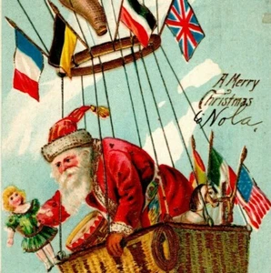Antike Weihnachts Postkarte patriotischer Weihnachtsmann rotes Gewand Spielzeug & Flaggen Heißluftballon - Bild 1 von 3