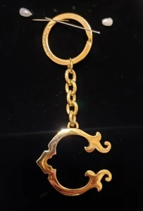 C Wonder Schlüsselanhänger goldfarbene Kette - Bild 1 von 5