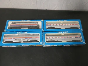 Life-Like Ho Scale Amtrak Locomotive with silver vista vision inn cars - Picture 1 of 8
