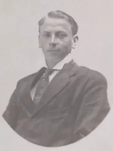 RPPC Handsome Dapper Young Gentleman in Tie Portrait Postcard AZO c1904-1918 - Picture 1 of 3