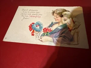 VINTAGE EMBOSSED VALENTINE'S POSTCARD CUPID WHISPERING IN WOMANS EAR & POEM  - Picture 1 of 2