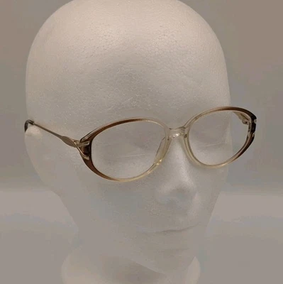 Marcos de gafas luxottica vintage detalles dorados marrón a blanco Foto 1 de 4