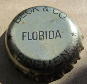 GORRA DE CERVEZA BECK & CO ALEMANIA CON IMPUESTO DE FLORIDA OBSOLETA TAPA PL DESCONTINUADA - Imagen 1 de 2