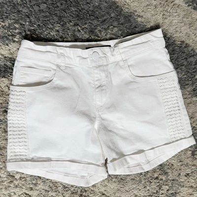 Pantalones cortos Guess blancos teñidos. Niño talla 14. Foto 1 de 4