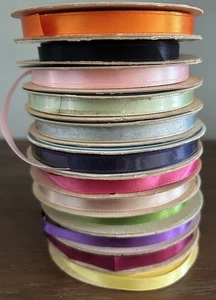 12  SPOOLS OF SATIN RIBBON.   “SINGLE FACE SATIN RIBBON WITH WOVEN EDGE” - Picture 1 of 2