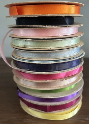 12  SPOOLS OF SATIN RIBBON.   “SINGLE FACE SATIN RIBBON WITH WOVEN EDGE” - Image 1 of 2