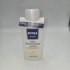 2003 Nivea Body Silky Shimmer Lotion helle/mittlere Haut 6,8 Unzen strahlender Ton 200 ml - Bild 1 von 2