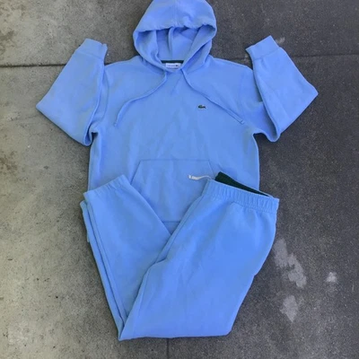 Conjunto de sudadera con capucha suéter (42) y pantalones deportivos Lacoste para mujer (42) azul Foto 1 de 4