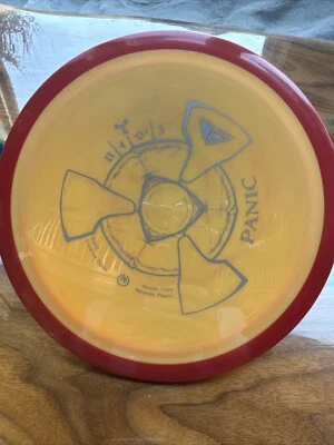 Axiom Disc Golf Neutron Panic Distance Driver 13/4/-0.5/3 - Orange With Red Rim - Image 1 of 2