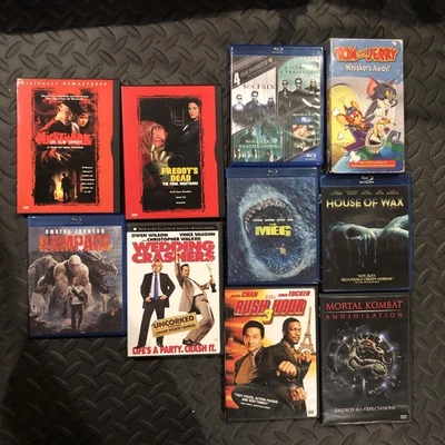 Warner Bros Lot: Five DVDs Four Blu-rays And One Vhs Tape - Image 1 of 2