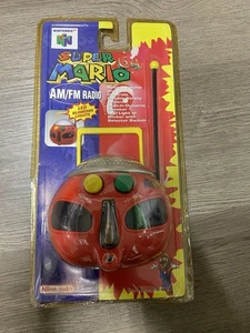 VINTAGE 1997 NINTENDO 64 SUPER MARIO PORTABLE FM/AM RADIO / Verpackung defekt - Bild 1 von 4