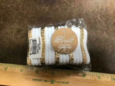 White an gold Stretch Bracelet by Hush  - Image 1 of 3