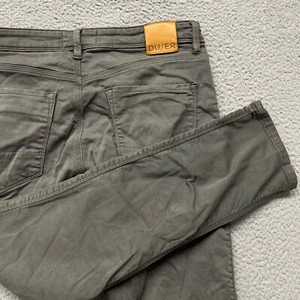 Pantalones DU/ER Para Hombres 36x30 (29) Gris N2X Relajado Cónico Elastizado Informal Preppy Chino - Imagen 1 de 18