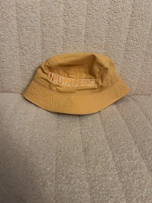 Sombrero de cubo números Larry June albaricoque medianoche orgánico se adapta hasta 7 1/2. Foto 1 de 2