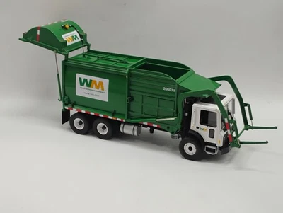 Camión de basura First Gear 1:34 gestión de residuos carga frontal Mack repuestos o reparación Foto 1 de 4