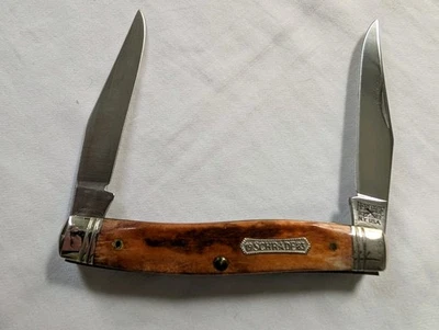SCHRADE HERITAGE SERIES 7801 Muskrat Sawcut Red Bovine  - Image 1 of 4