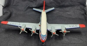 VINTAGE NWA NORTHWEST DC-7C N1057 ASAHITOY TIN TOY AIRPLANE JAPAN ESTATE FIND - Picture 1 of 9