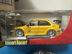 Jada Toys Import Racer Mitsubishi Lancer Evolution VI amarillo escala 1:24 raro - Imagen 1 de 5