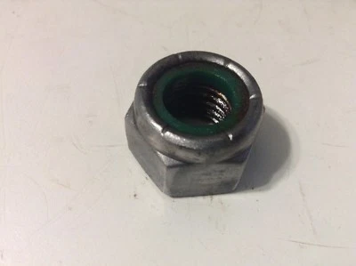 131-12 - A New 9/16-12 Lock Nut For An IH 278, 385, 454, 464, 474, 484 Tractors - Image 1 of 3