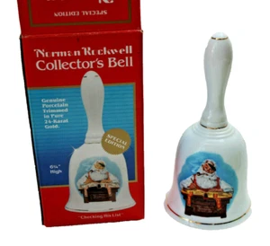 NUEVA EN CAJA DE COLECCIÓN CAMPANA DE PORCELANA NORMAN ROCKWELL ""REVISANDO SU LISTA"" NAVIDAD - Imagen 1 de 6