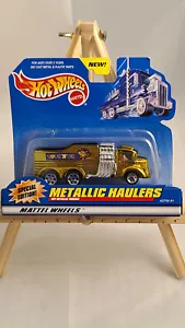 Hot Wheels transportadores metálicos - Toys 'R Us edición especial dorado 1999 - Imagen 1 de 3