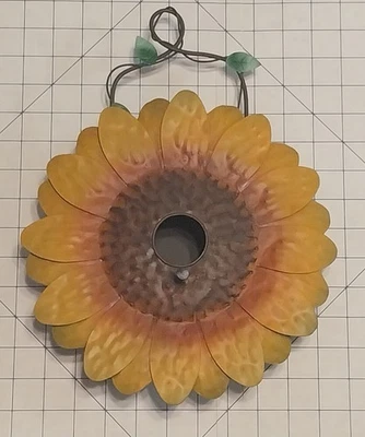Pajarera de girasol arte metálico con limpieza Foto 1 de 4