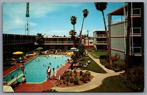 Postcard Phoenix AZ c1950s Sahara Motor Hotel Patio Swimming Pool Umbrellas - Picture 1 of 2