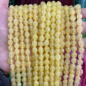 Cuentas de calcedonia de cuarzo amarillo claro pepita de guijarros lisos irregulares teñidos de 6x8 mm - Imagen 1 de 4