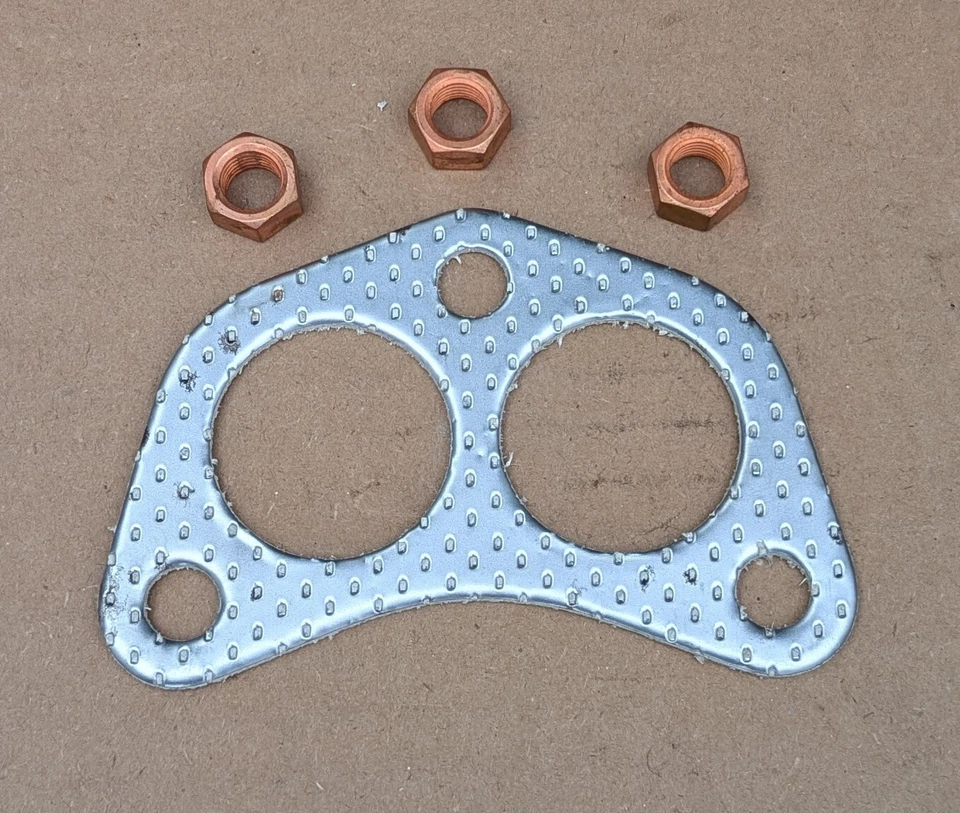 Junta y tuercas de brida de tubo de escape Mopar/Mitsubishi NOS 71-74 Dodge Colt 1600 cc Foto 1 de 1