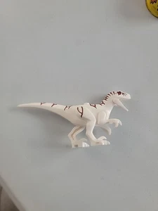 LEGO Jurassic World: Atrociraptor Dinosaurier Minifigur / 76945 / weiß mit braun / LESEN  - Bild 1 von 9