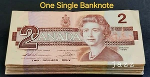 Billete canadiense de 2 dólares del Banco de Canadá 1986 papel moneda antiguo descontinuado - Imagen 1 de 4