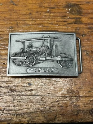 Hebilla de cinturón de peltre vintage 1975 tractor oruga Foto 1 de 4