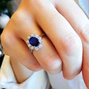 ANELLO ENGAGEMENT IN ORO BIANCO 18 KT. TIT. 750 CON ZAFFIRO E BRILLANTI. - Foto 1 di 7