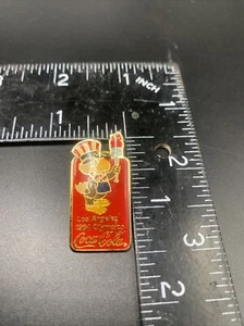 1984 Los Angles Olympic Pin Coca Cola Mascot Sam With Torch Vintage USA 🇺🇸 - Picture 1 of 4
