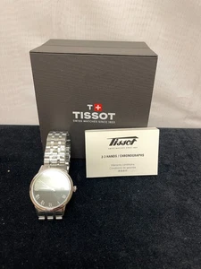 Orologio da polso analogico Tissot Classic Dream T129410 A da uomo quadrante nero cinturino argento - Foto 1 di 13