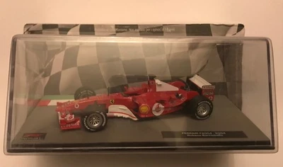 p 328 -  Scala 1/43 - FORMULA 1 - FERRARI F2004 di Rubens Barrichello  (2004) - Immagine 1 di 3