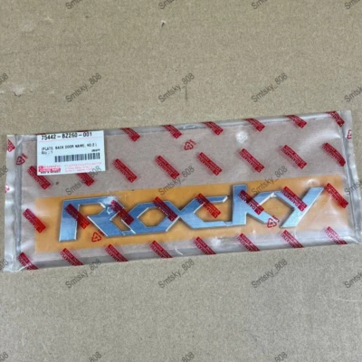 1pcs NEW Genuine DAIHATSU ROCKY FRONT FENDER SIDE EMBLEM GENUINE PARTS - Image 1 of 4