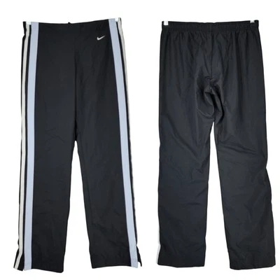 Pantalones de chándal Nike de colección M para mujer rompevientos negros Lt azul blanco forrados de malla deportes Foto 1 de 4