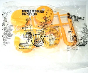 1979 Ronald McDonalds Yellow Plastic Puzzle Lock Happy Meal Toy NOS New MIP - Picture 1 of 3
