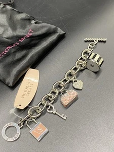 NWT Rare Victoria's Secret Silver Dangle Charm Purse Bracelet - Picture 1 of 7