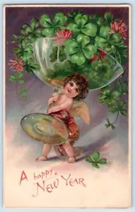 1908 HAPPY NEW YEAR CHERUB CHAMPAGNER UNTERTASSE 4-BLÄTTRIGE KLEEBLÄTTER KLEEBLÄTTER POSTKARTE #1 - Bild 1 von 2